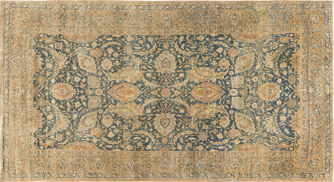 Antique Persian kirman rug