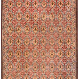 A Spanish Wool Carpet Having Floral Motifs