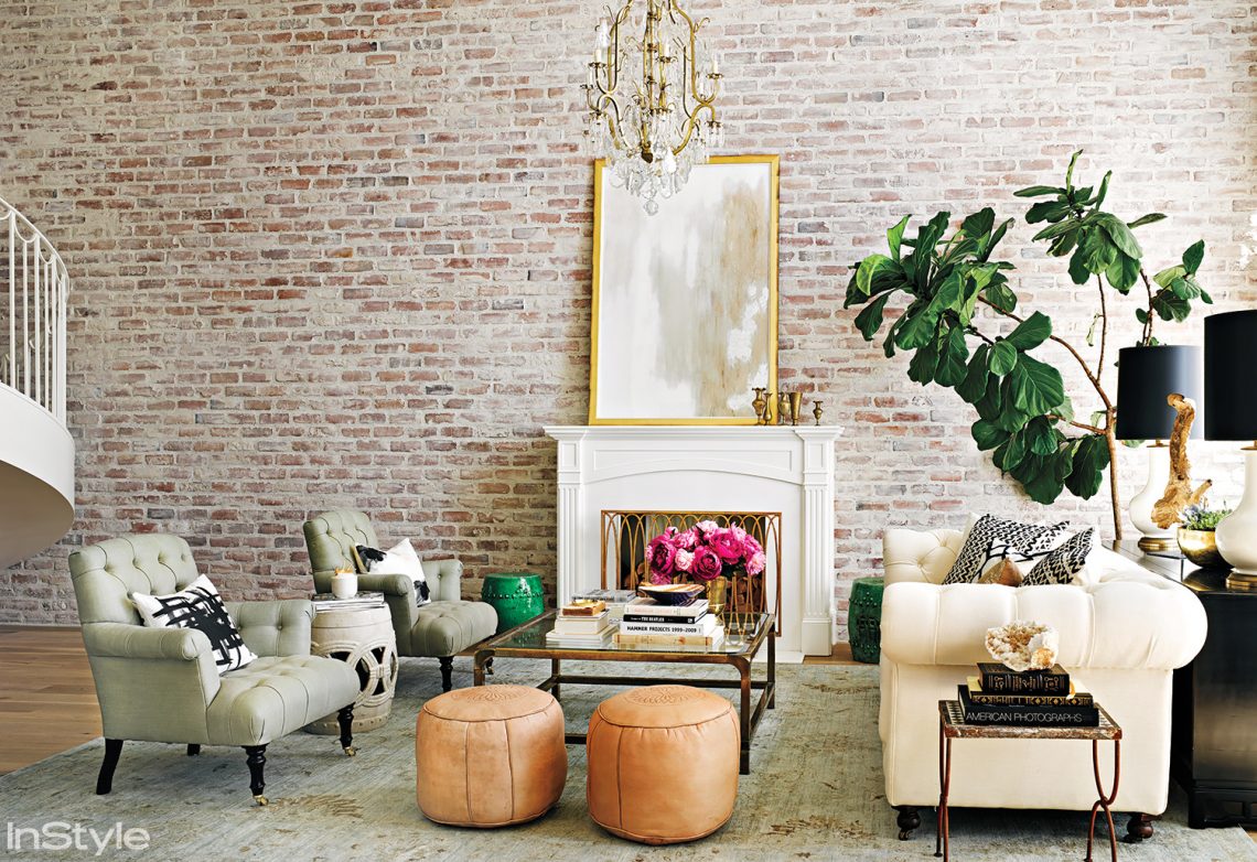 lauren conrad interior decor, elegant living room, eclectic living room, brick wall interior, crystal chandelier decor,