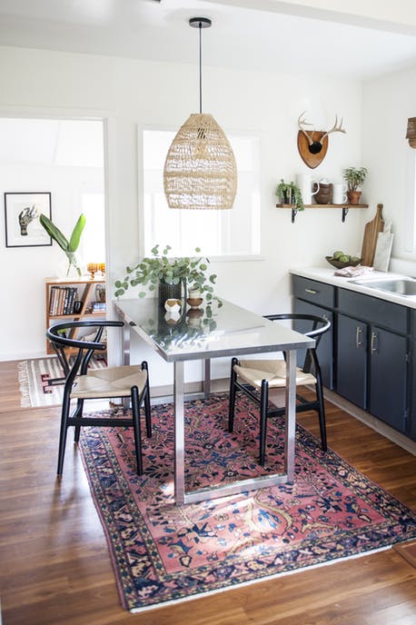 statement rugs, oriental antique rug in dining room