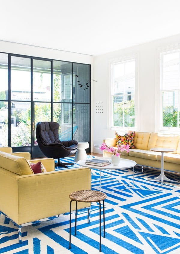 statement rug in living room, geometric rug, bold rug