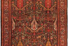 Dughi – The “Living Coral” of Antique Sarouk Rugs