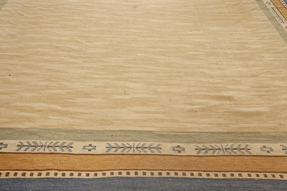 Large Hand-woven Vintage Scandinavian Rug with an Ample Tan Field and Green, Ivory, Amber, and Blue Border BB7067