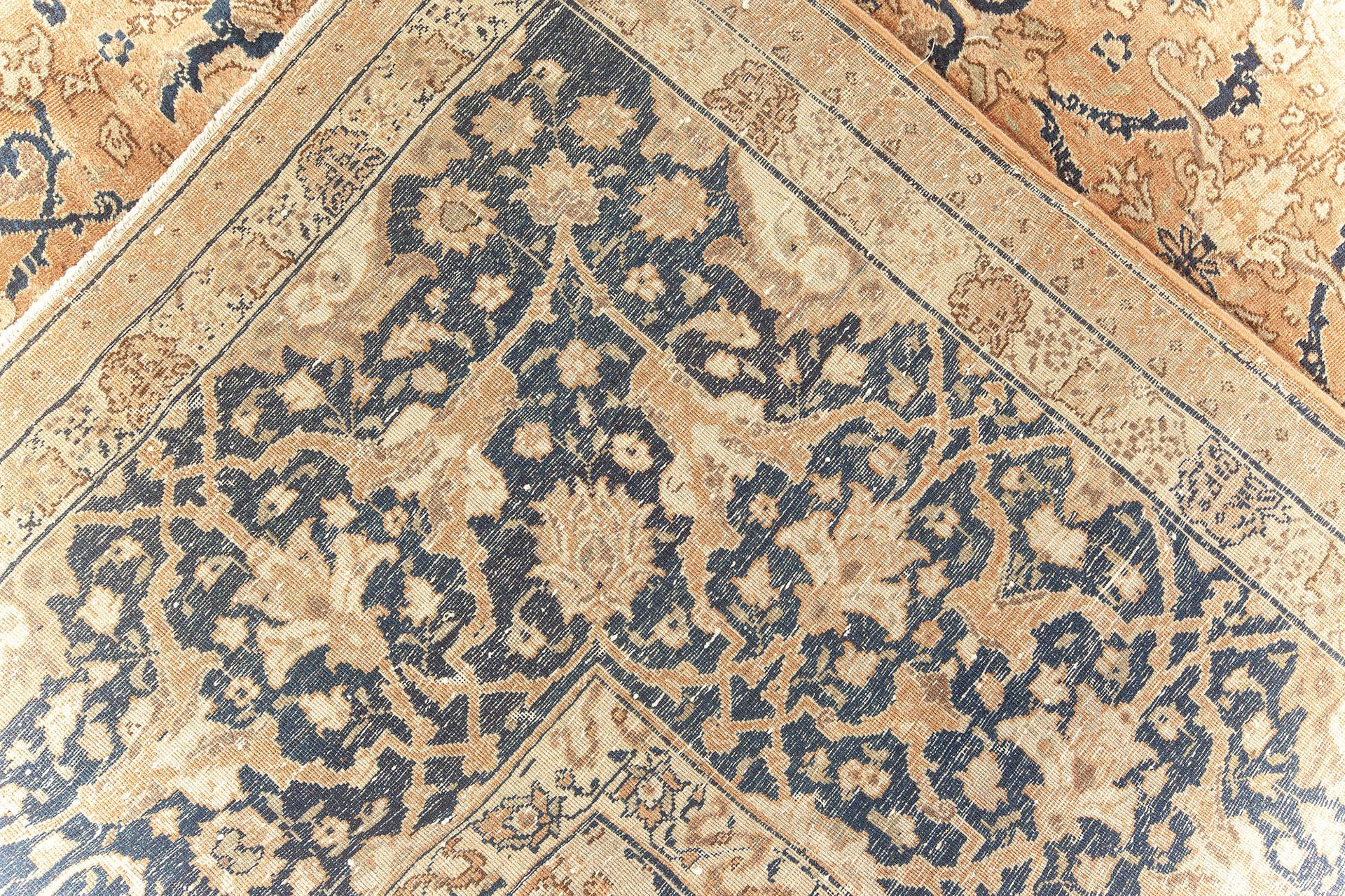 Close-up photos of a fine Tabriz rug BB5927, showing the very high knot-count that is required to weave intricate details. 