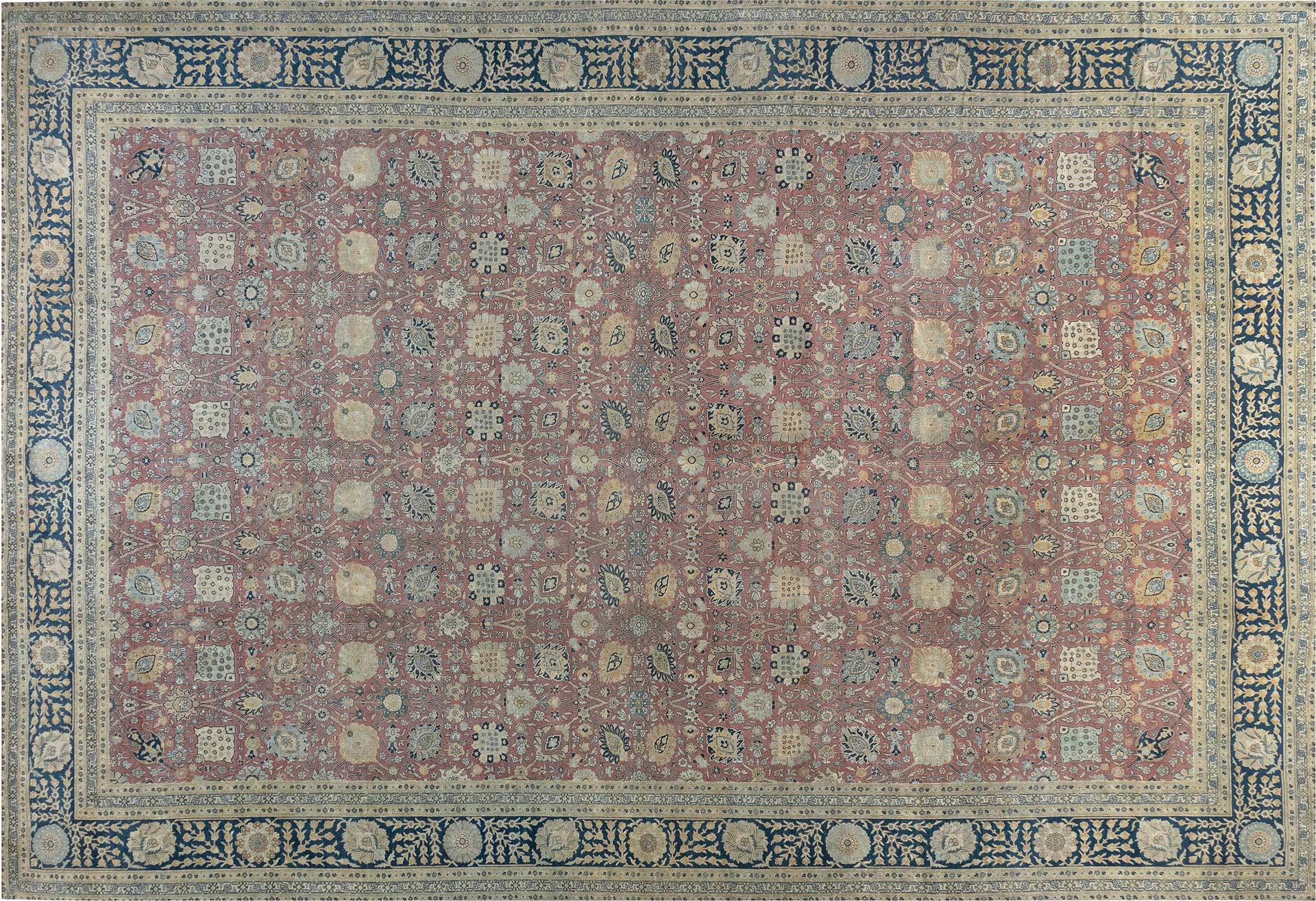 A large Persian Tabriz BB7246 with all over stylized floral design on a jewel toned background. 
