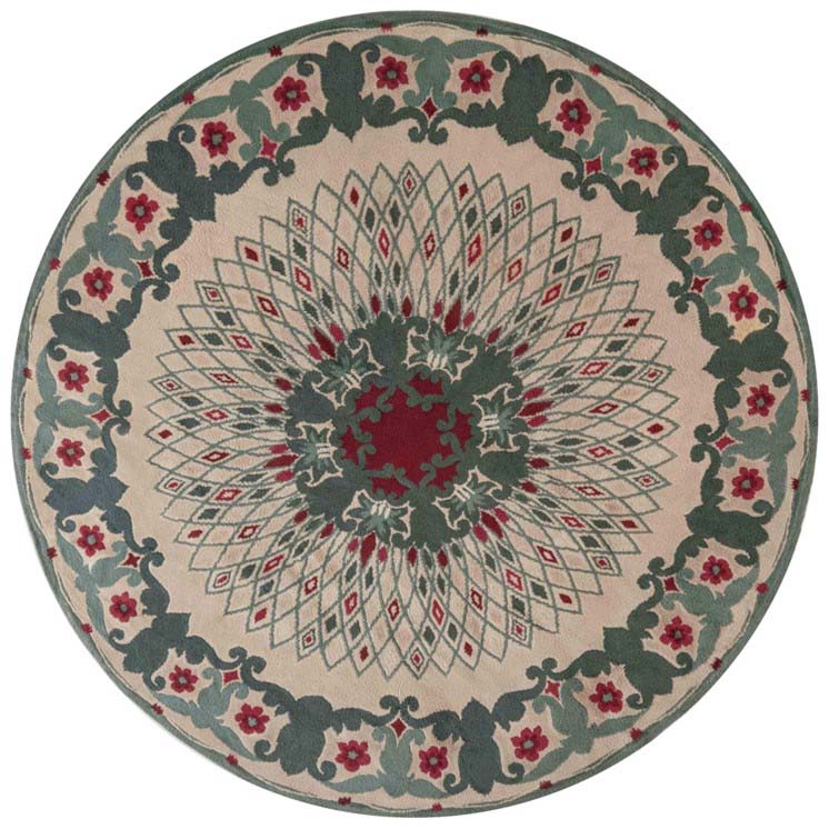A circular area rug created for a living room by Paule Leleu, Doris Leslie Blau Collection.