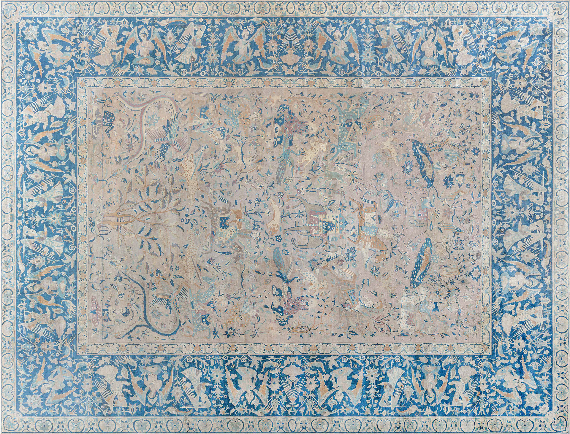 A whimsical antique Indian rug with an ample ultramarine border