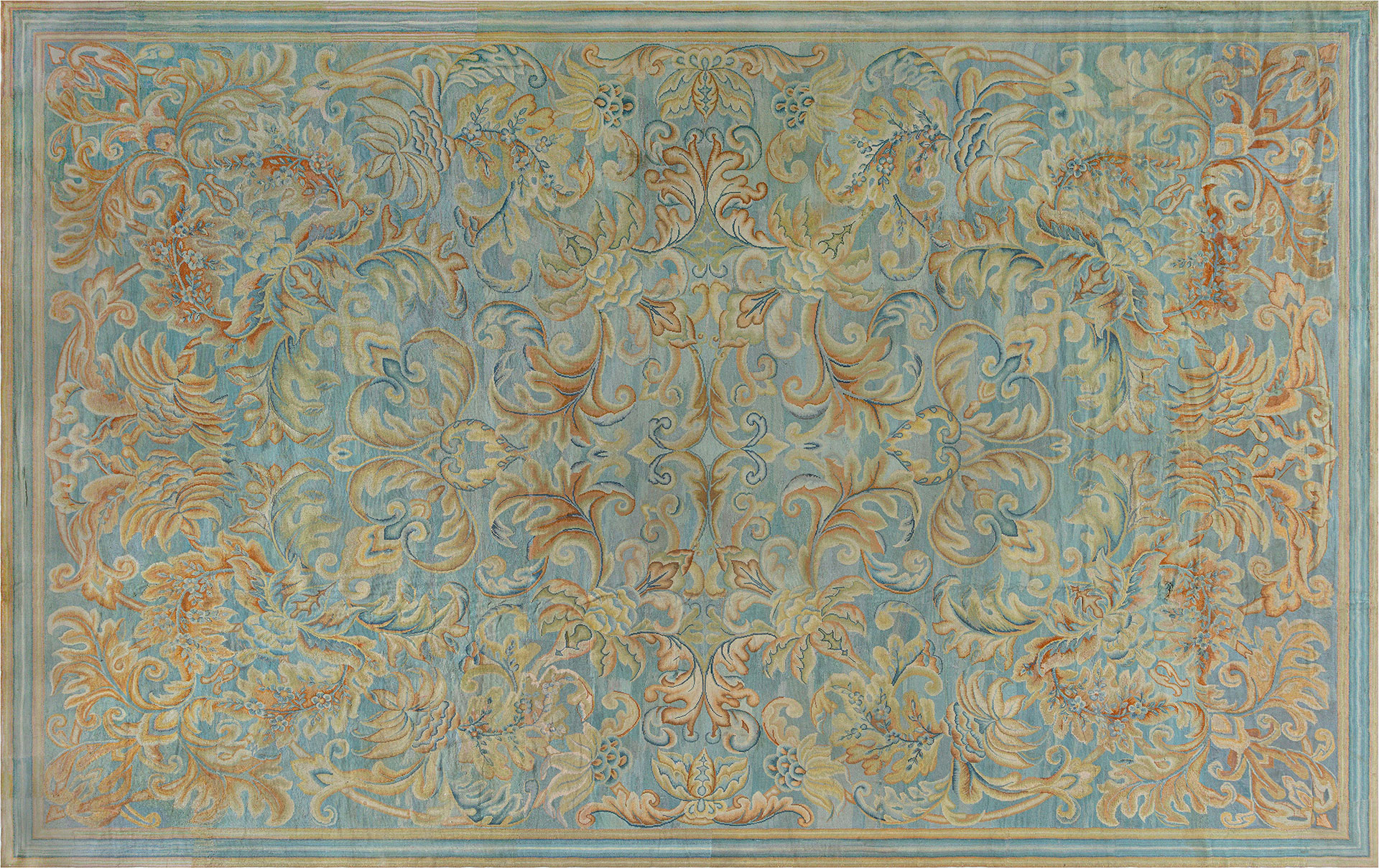 An antique English needlework displaying superb shades of azure abrash